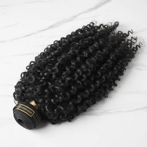 Luxury raw Vietnamese curly hair bundle on white marble surface